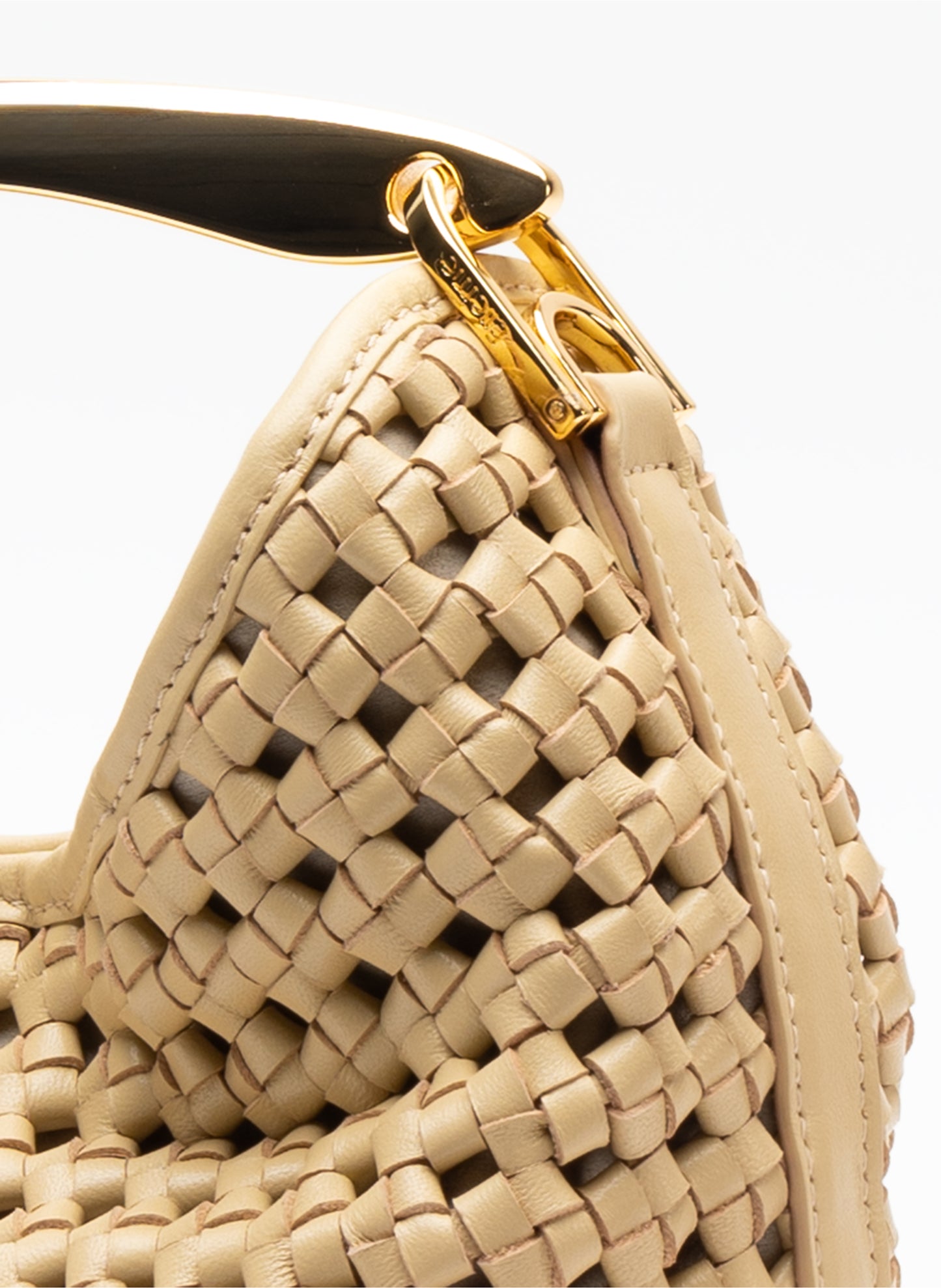 Petit Boomerang Beurre de cuir tressé